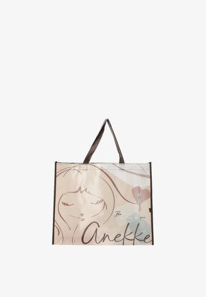 Borsa tote beige con manici marroni, con uno schizzo semplice del volto di una ragazza, un piccolo gatto, forme a cuore e la scritta "Anekke."
