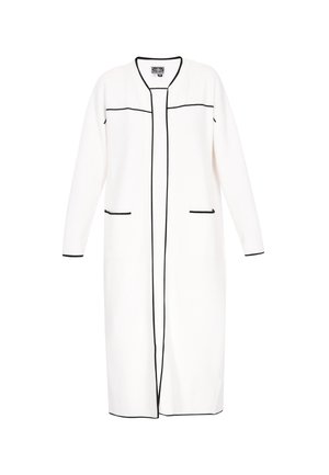 Witte lange cardigan met zwarte piping, voorzakken en een ronde halslijn. Gemaakt van zachte stof met lange mouwen en een open voorkant ontwerp.