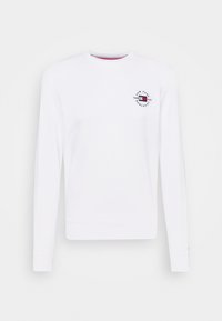 Felpa bianca con maniche lunghe, scollatura rotonda e un logo circolare con testo sul petto. Realizzata in un tessuto liscio.