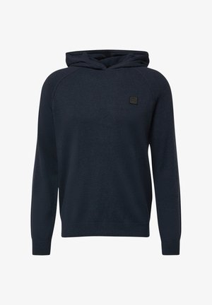 Marineblauwe gebreide hoodie met lange mouwen, geribbelde manchetten en zoom, en een klein zwart vierkant logo-label op de linkerborst.