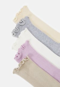 Set of six ribbed socks in various colors: pastel pink, cream, white, light gray, and beige, with scalloped edges. Soft knitted texture.