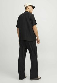 Jack & Jones Verryttelyhousut - black