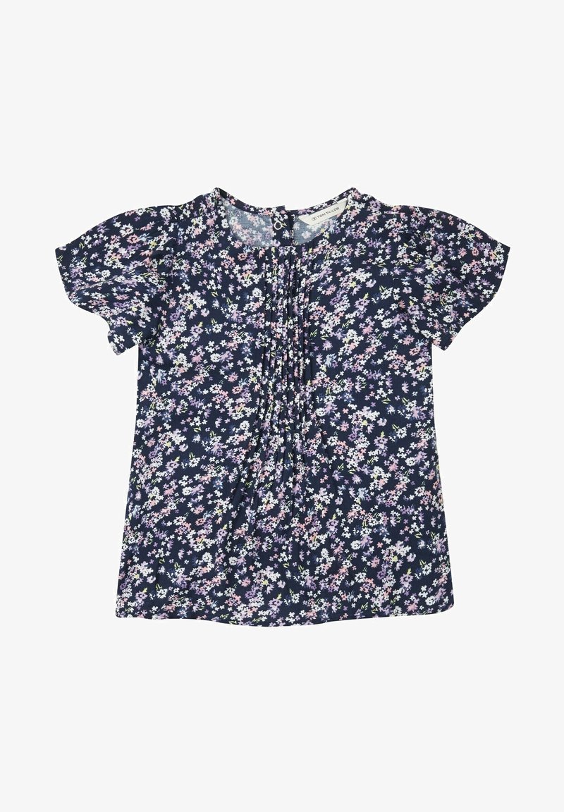 Blouse bleu marine à manches courtes avec devant plissé et petit motif floral rose, blanc et lavande, col rond et fermeture par bouton au dos.
