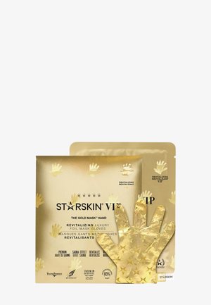 Gants masque pour les mains à la feuille d’or de Starskin, présentés dans un emballage doré avec un gant visible à l’avant.