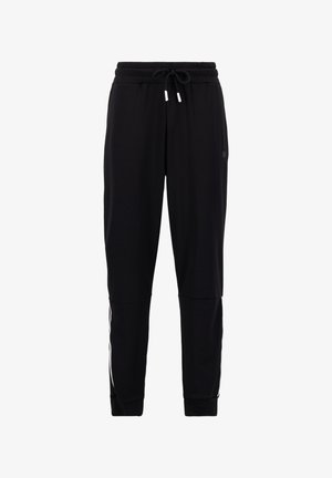Black jogger pants made of soft fabric with an elastic waistband, adjustable drawstring, and white side stripes for accent.