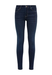Skinny jeans made of dark blue denim, featuring a classic five-pocket design and a front metal button closure. Smooth texture and slim fit.