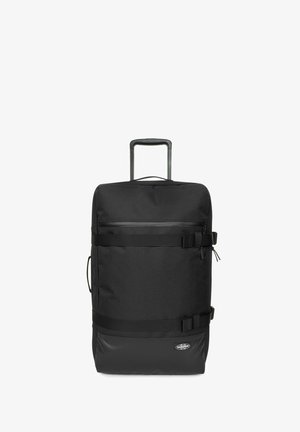 Schwarze Reisetasche mit ausziehbarem Griff, texturiertem Stoff, Reißverschluss-Vorfronttasche und verstellbaren Trägern für sicheren Verschluss.