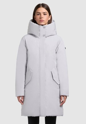 Helehall hajutatud sulejope kõrge krae, ees klõpskinnituse ja kahe küljetaskuga. Sile tekstuur veidi läikiva viimistlusega.