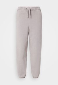 Lysegrå joggebukser laget av en myk bomullsblanding, med elastisk midje og snor, tettsittende ben og ribbestrikkede mansjetter.