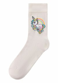 Calcetín de algodón blanco con puño acanalado, que presenta un diseño colorido de unicornio con un arcoíris. El unicornio tiene un corazón rosa y una larga melena multicolor.