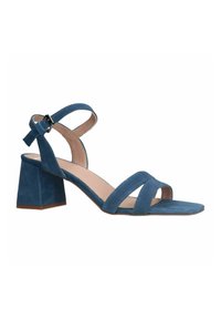 Blaue Wildledersandale mit zwei überkreuzten Riemen, verstellbarem Knöchelriemen und quadratischem Absatz. Einfaches Design mit glatter Textur.