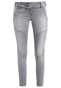 Pantalones de mezclilla gris de corte ajustado con acentos acolchados texturizados en los muslos, cierre de dos botones y bolsillos tradicionales.