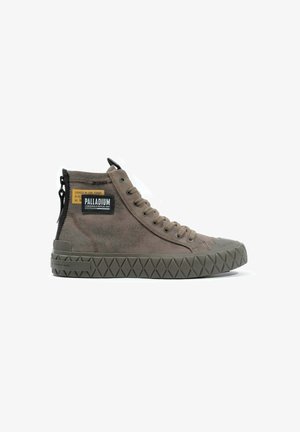 Brown high-top sneaker made of textured canvas with a rubber sole. Features a side zipper and patterned hexagonal tread for grip.