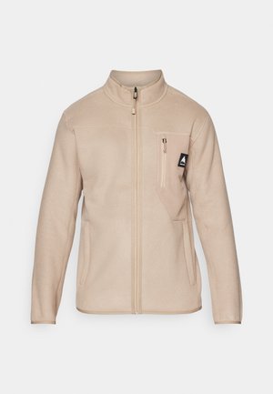 Beige Fleecejacke mit hohem Kragen, Frontreißverschluss und Brusttasche mit kleinem Logo. Glatte Textur, gerader Schnitt und lange Ärmel.