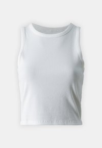 Vit ribbad tanktop med rund halsringning, ärmlös design och kort längd. Slät textur, minimala sömmar och inga synliga logotyper.