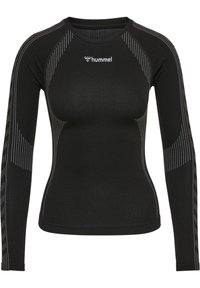 Camiseta atlética de manga larga negra con patrones de puntos blancos en las mangas y hombros, diseño ajustado, y logo blanco de "hummel" en el pecho.