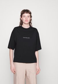 Calvin Klein Jeans BLOWN TEE - T-shirts med print - black