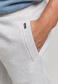 Superdry & Co Spodnie treningowe