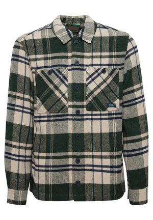 Plaid flannel shirt in green, white, and navy. Features two chest pockets, button closure, pointed collar, and textured fabric.