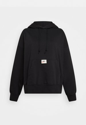 Mustapaita, jossa on kiristettävä huppu, etupuolella kengurutasku ja pieni etiketti, jossa on Nike-logo. Valmistettu pehmeästä, yksivärisestä kankaasta.