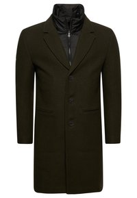 Manteau vert olive, en mélange de laine, à boutonnage simple avec un col cranté, trois boutons et deux poches latérales. Doublure intérieure zippée noire.