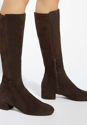Brown suede knee-high boots with a low block heel and side zipper detail, featuring a smooth texture and clean lines.