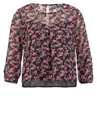 Blouse noire transparente à manches longues avec motif floral rose et turquoise, encolure avec ouverture en goutte d'eau et poignets élastiques.