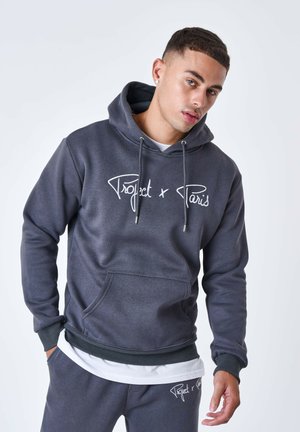 Sweat à capuche gris avec cordons, poche avant et graphique blanc "Project x Paris". Poignets et ourlet côtelés, matériau doux, coupe décontractée.