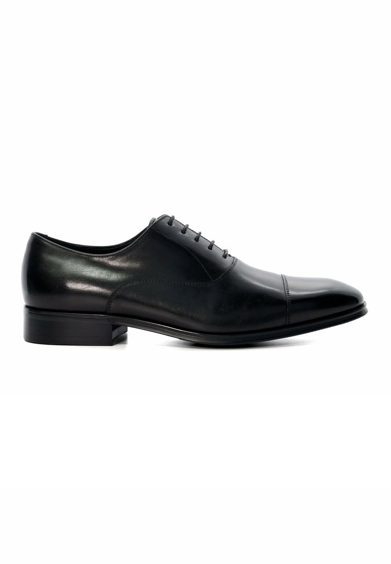 Black leather dress shoe with a rounded toe, smooth texture, five-eyelet lace-up design, and a low, stacked heel.