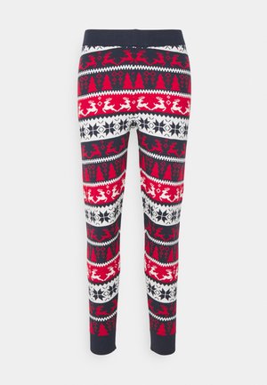 Red, white, and navy patterned leggings with festive motifs, including reindeer and snowflakes, featuring a stretchy waistband and tapered fit.