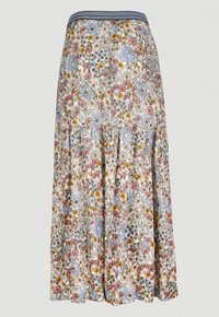 Jupe longue à volants froncés, base blanche, motif floral multicolore en bleu, jaune, rose, et une ceinture élastique à rayures marine.