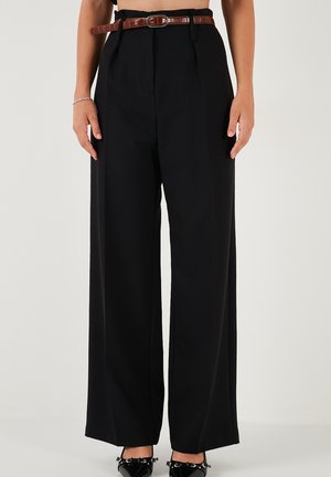 Black wide-leg trousers featuring a high waist, prominent pleats, and a brown belt with a textured finish. Smooth, lightweight fabric.