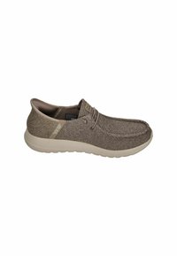 Grey textile shoe with a rounded toe, elastic laces, and a soft outsole. Features a textured upper and subtle branding on the side.