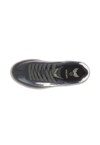 Black sneaker with textured surface, silver accents, and patterned, woven laces. Features a gum rubber outsole. Brand logo on the insole.