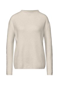 Beige geribde trui met een hoge hals en lange mouwen; contrasterende donkere accenten langs de zijkanten; zachte textuur.