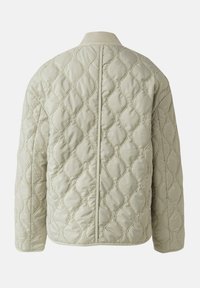 Steppjacke in Hellgrün mit strukturiertem Design, ausgestattet mit einem strukturierten Wellenmuster, geripptem Kragen und langen Ärmeln.