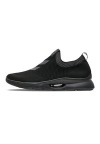 Black slip-on sneaker made of textured knit material, with a low-profile sole and reflective accents on the upper for added visibility.