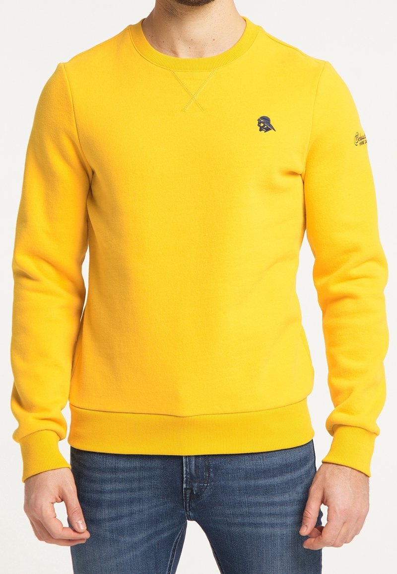 Felpa gialla con collo rotondo, polsini e orlo a coste. Dettaglio logo frontale in blu navy. Materiale morbido, vestibilità regolare, maniche lunghe.