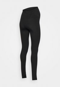 Sorte leggings lavet af strækbart stof, med en høj talje og en tætsiddende silhuet, glat tekstur uden mønstre eller hardware.