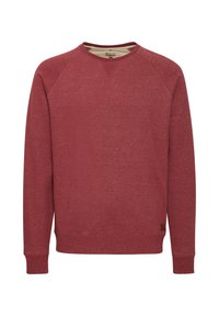 Rode sweatshirt met een ronde hals, lange raglanmouwen, ribgebreide boorden en zoom, gemaakt van zachte, gestructureerde stof. Bevat een klein merklabel.