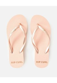 Infradito rosa con suola texturizzata, cinturini in metallo color oro rosa e logo "RIP CURL" stampato in oro sulle suole.
