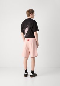 HUGO DEXEY RB - Donji dijelovi trenirke - light pastel pink