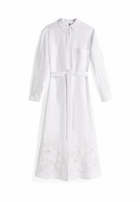 Vestido blanco de manga larga hecho de lino. Cuenta con cuello, bolsillo frontal, cinturón en la cintura y un intrincado bordado floral en el dobladillo.