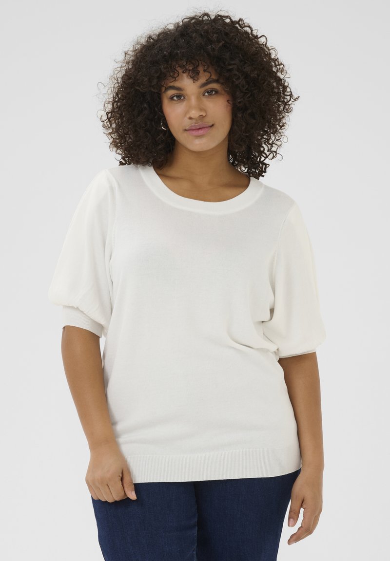 Cream-colored short-sleeve sweater with a round neckline and soft, relaxed fit. Features textured, puffed sleeves and ribbed hem.