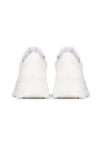 White sneakers with a smooth leather upper, padded collar, thick sole, and minimal detailing, featuring a cushioned inner lining.