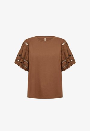 Pruun lühikeste varrukatega topp ümar kaeluse ja sakilise servaga õõneslillemustritega õhuliselt volangvarrukatega.