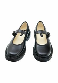 Zwarte leren Mary Jane schoenen met een ronde neus, enkelband met een gesp, rubberen zool en gestructureerde stiksel rond de rand.