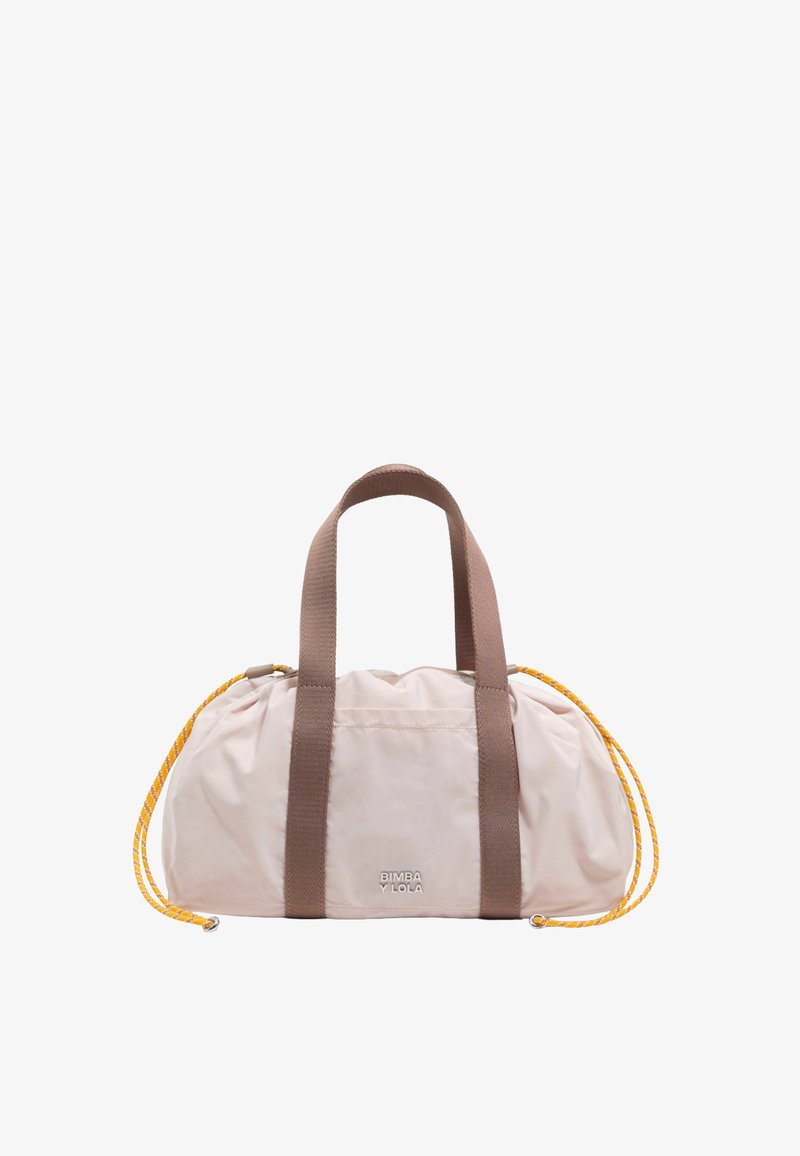 Heledad roosa nailonist duffel-kott pruuni kangast käepidemete ja kollaste köieaktsentidega. Omab kogutud ülaosa ja logo esiküljel.