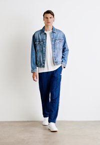 Lacoste Tepláky - globe