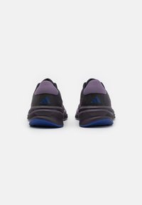 adidas Performance SUPERNOVA STRIDE - Zapatillas running asfalto - core black/shadow violet/lucid blue